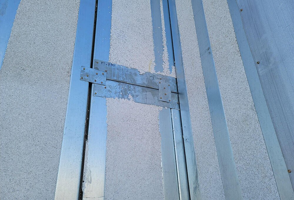 Close-up of a ThermaSteel panel: light gauge steel studs bonded to EPS